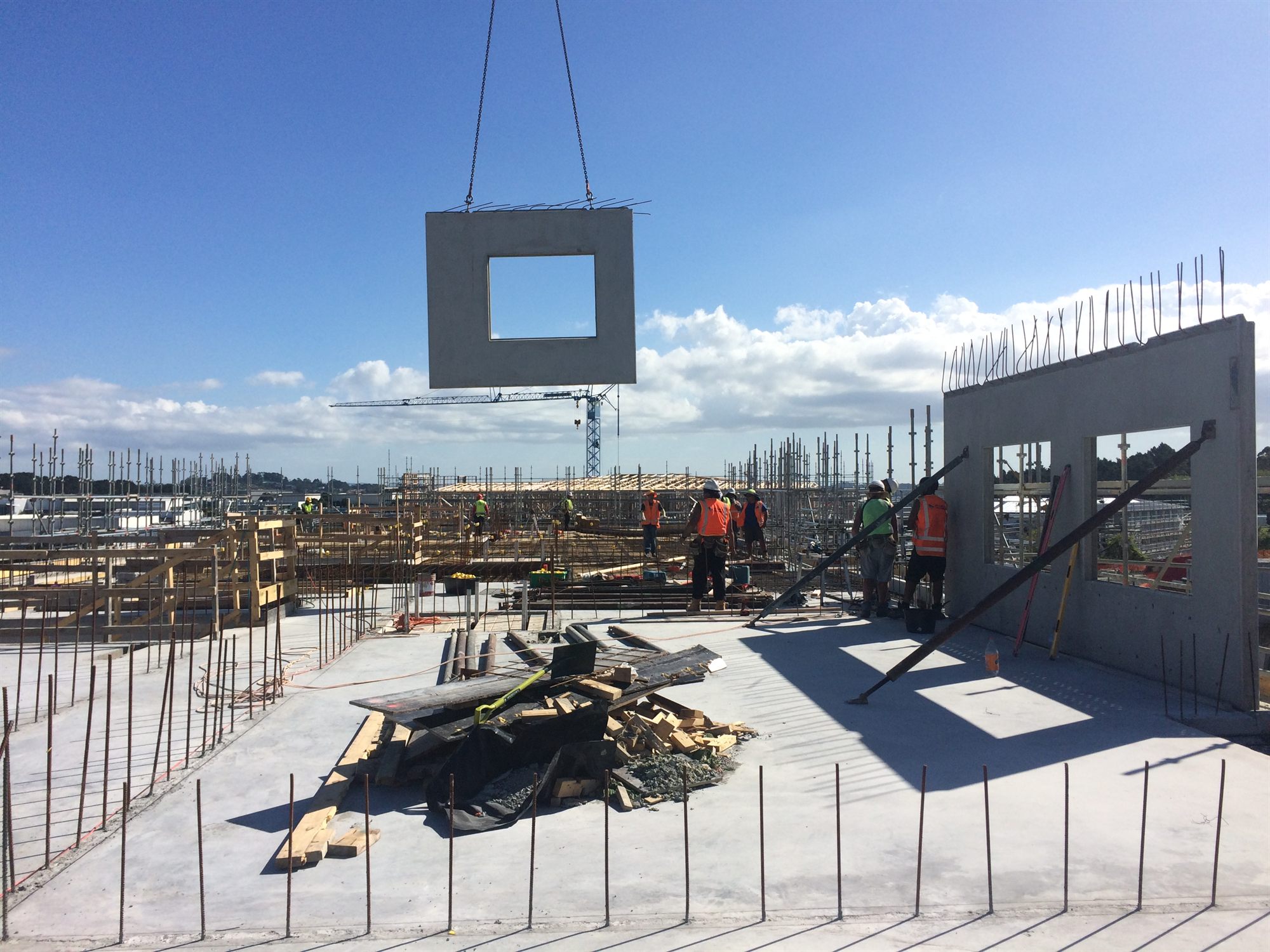 Concrete site work with crane lift