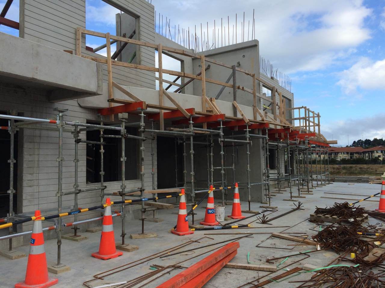 Concrete structure with scaffold and cones